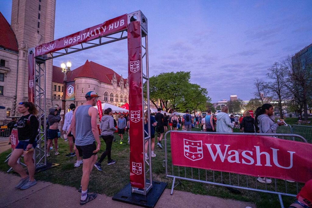 People entering and exiting the hospitality hub, located in front of Union Station in St. Louis
