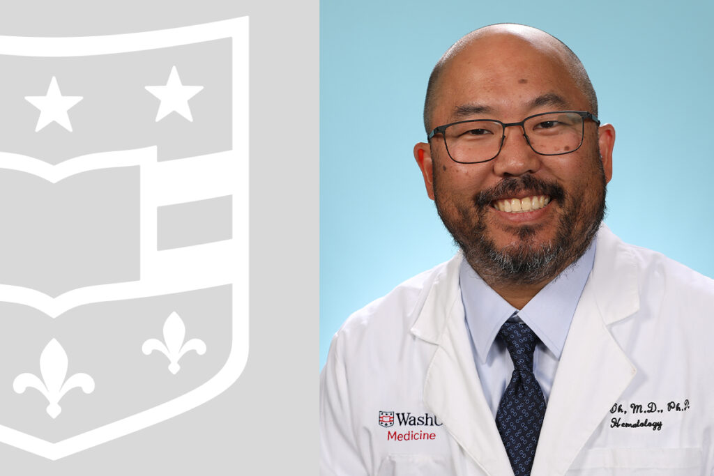 Physician smiling in white coat